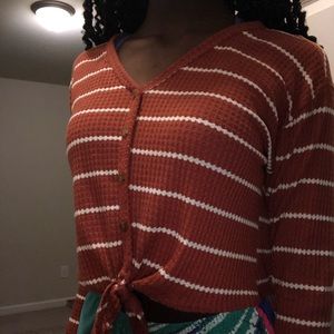 orange and white crop top